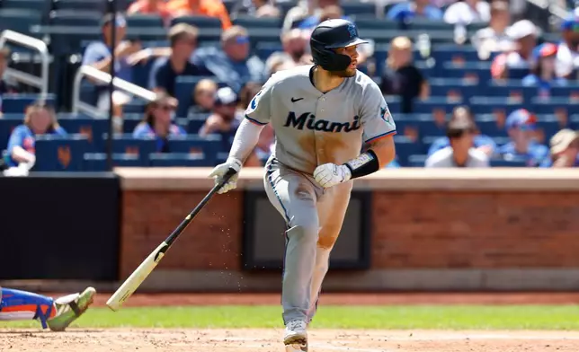 Miami Marlins' Joe Mack drops his bat after hitting home run against the New York Mets during the fifth inning of a baseball game, Sunday, Aug. 2, 2026, in New York. (AP Photo/Noah K. Murray)