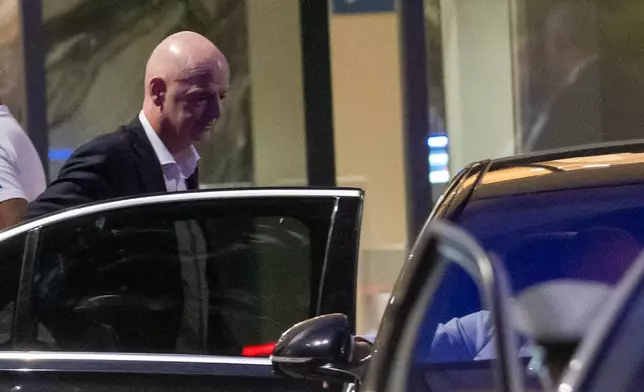 FIFA president Gianni Infantino leaves after attending a Women AFCON 2026 soccer match between Malawi and Zambia, in Rabat, Morocco, Wednesday, Aug. 5, 2026. (AP Photo)