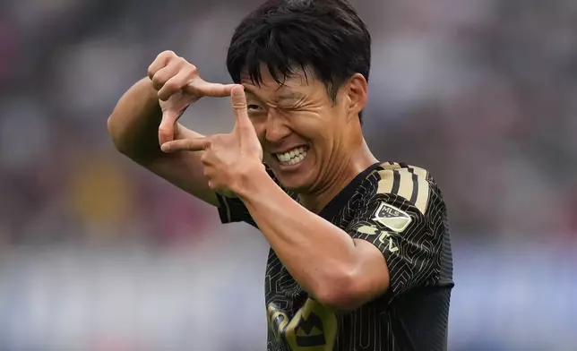 Los Angeles FC's Son Heung-min celebrates his goal during the first half of an MLS soccer match against the Vancouver Whitecaps, in Vancouver, Saturday, August 1, 2026. (Darryl Dyck/The Canadian Press via AP)