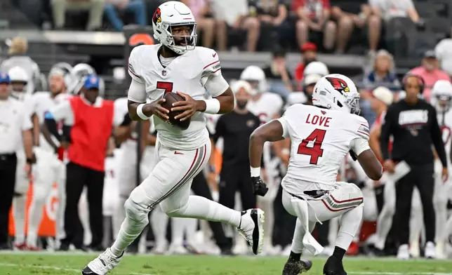 Arizona Cardinals quarterback Jacoby Brissett looks to pass against the Las Vegas Raiders during the first half of a preseason NFL football game, Thursday, Aug. 13, 2026, in Las Vegas. (AP Photo/David Becker)
