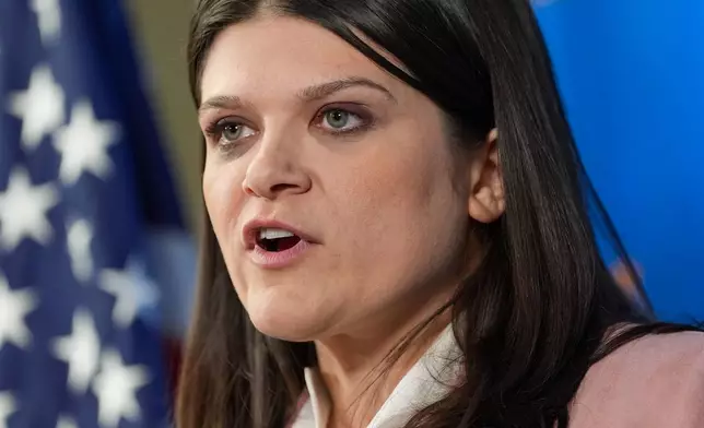 Rep. Haley Stevens, D-Mich., left, a candidate in the Democratic primary for U.S. Senate in Michigan, speaks during a campaign event at the UA Local Plumbers 98 Union Hall, Sunday, Aug. 2, 2026, in Madison Heights, Mich. (AP Photo/Julia Demaree Nikhinson)