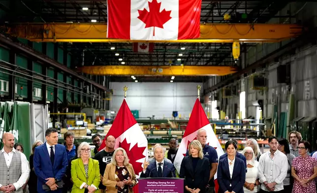 Minister of Finance and National Revenue Francois-Philippe Champagne speaks at a news conference on Canada's response to U.S. tariffs, at a roofing company in Ottawa, on Tuesday, Aug. 25, 2026. (Justin Tang/The Canadian Press via AP)