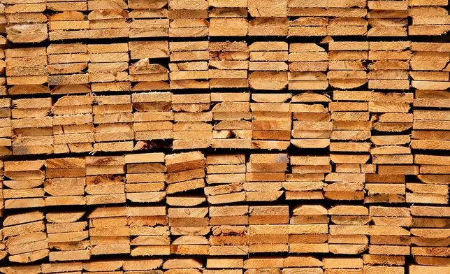 Lumber products are seen at Ideal Roofing in Ottawa on Tuesday, Aug. 25, 2026. (Justin Tang/The Canadian Press via AP)