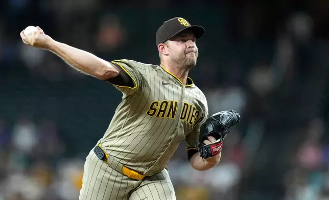 San Diego Padres starting pitcher Michael King throws against the Arizona Diamondbacks during the first inning of a baseball game, Monday, Aug. 3, 2026, in Phoenix. (AP Photo/Ross D. Franklin)