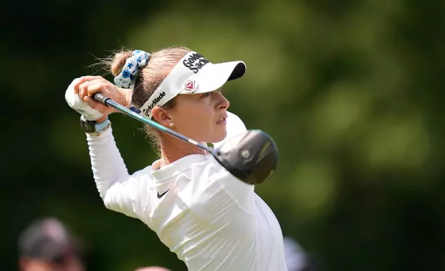 Nelly Korda hits hits on the 13th hole during the first round of the LPGA FM Championship golf tournament in Norton, Mass., Thursday, Aug. 27, 2026. (AP Photo/Charles Krupa)