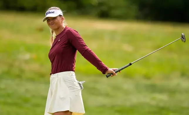 Emily Kristine Pedersen, of Denmark, reacts after missing a birdie on the 10th hole during the first round of the LPGA FM Championship golf tournament in Norton, Mass., Thursday, Aug. 27, 2026. (AP Photo/Charles Krupa)