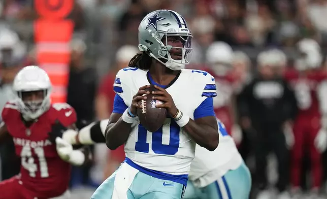 Dallas Cowboys quarterback Joe Milton III (10) drops back to pass in the first half of a preseason NFL football game against the Arizona Cardinals Saturday, Aug. 22, 2026, in Glendale, Ariz. (AP Photo/Rick Scuteri)