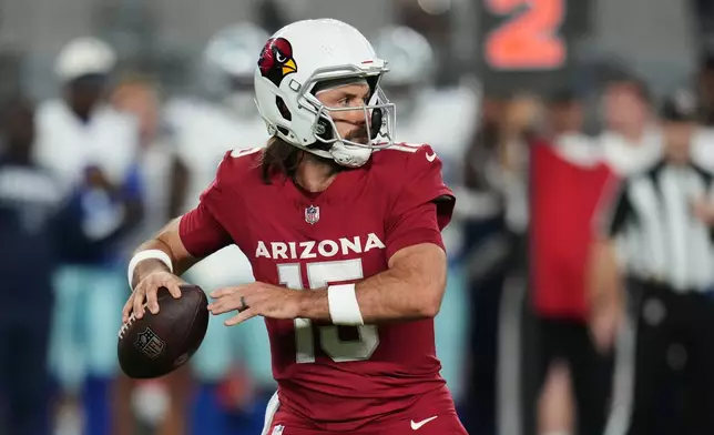 Arizona Cardinals quarterback Gardner Minshew II (15) throws a pass in the first half of a preseason NFL football game against the Dallas Cowboys Saturday, Aug. 22, 2026, in Glendale, Ariz. (AP Photo/Rick Scuteri)