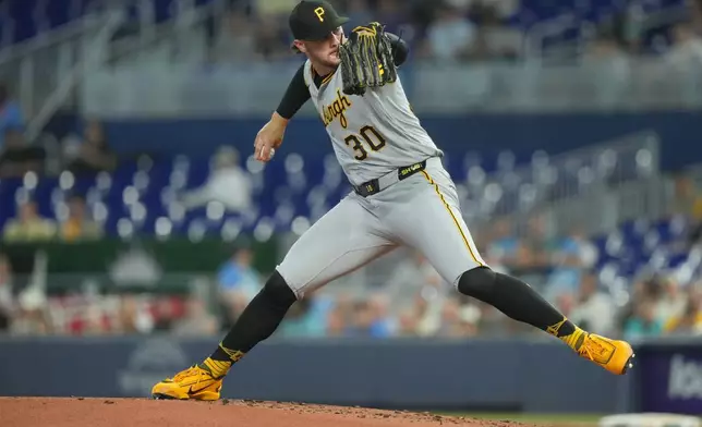 Pittsburgh Pirates starting pitcher Paul Skenes (30) aims a pitch during the first inning of a baseball game against the Miami Marlins Tuesday, Aug. 11, 2026, in Miami. (AP Photo/Marta Lavandier)