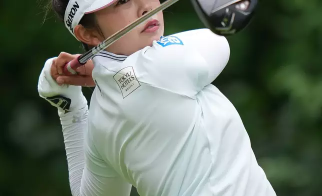 Miyu Yamashita, of Japan, watches her tee shot on the fourth hole during the third round at the LPGA Canadian Women's Open golf tournament in Edmonton, Alberta, Saturday, Aug. 22, 2026. (Darryl Dyck/The Canadian Press via AP)