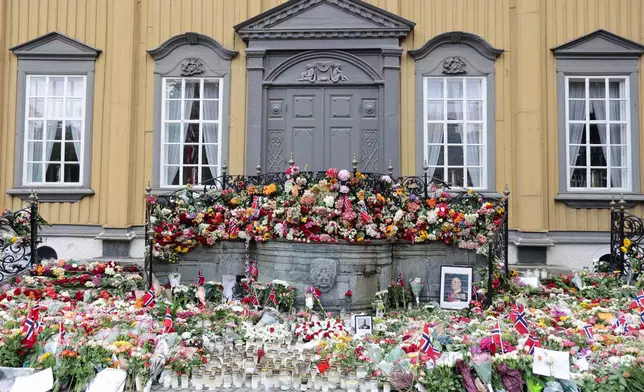 Flowers and condolences surround Stiftsgården following the death of King Harald V on Friday in Trondheim, Norway, Saturday, Aug. 29, 2026. (Jan Langhaug/NTB Scanpix via AP)