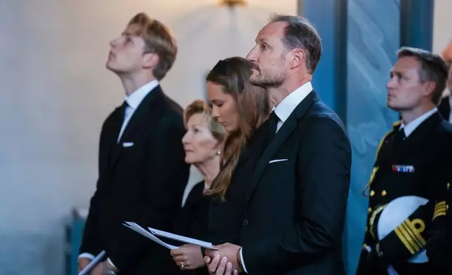 From right, Norway's King Haakon, Princess Ingrid Alexandra, Queen Sonja and Prince Sverre Magnus attend the mourning service for King Harald in Asker church, Asker, Norway, Sunday Aug. 30, 2026. (Javad Parsa/NTB via AP)
