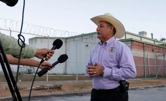 Cameron County Sheriff Manuel Treviño speaks during a news conference outside of the Carrizalez-Rucker Cameron County Detention Center shortly after Immigration and Customs Enforcement officer Christian Castro was released in Brownsville, Texas on Thursday, Aug. 27, 2026. (AP Photo/Michael Gonzalez)