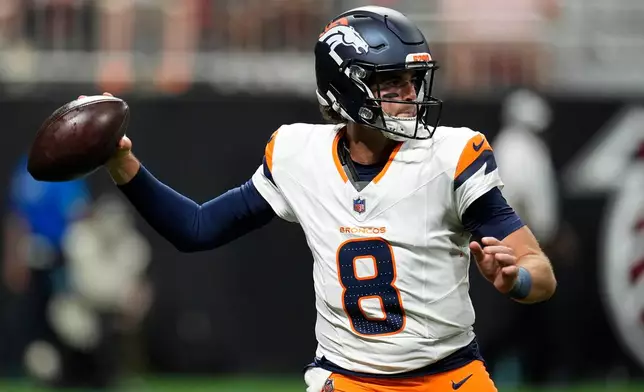 Denver Broncos quarterback Jarrett Stidham (8) passes during the first half of a preseason NFL football game, Friday, Aug. 14, 2026, in Atlanta. (AP Photo/Mike Stewart)