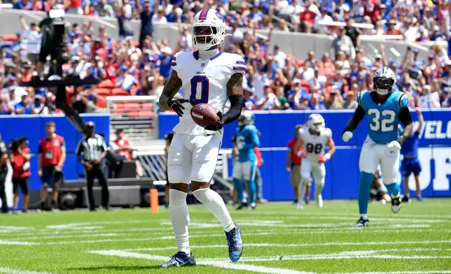 Buffalo Bills wide receiver Keon Coleman celebrates after catching a touchdown pass during the first half of a preseason NFL football game against the Carolina Panthers, Saturday, Aug. 15, 2026, in Orchard Park, N.Y. (AP Photo/Adrian Kraus)