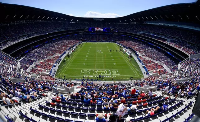 Fans find their seats in Highmark Stadium before a preseason NFL football game between the Buffalo Bills and the Carolina Panthers, Saturday, Aug. 15, 2026, in Orchard Park, N.Y. (AP Photo/Adrian Kraus)