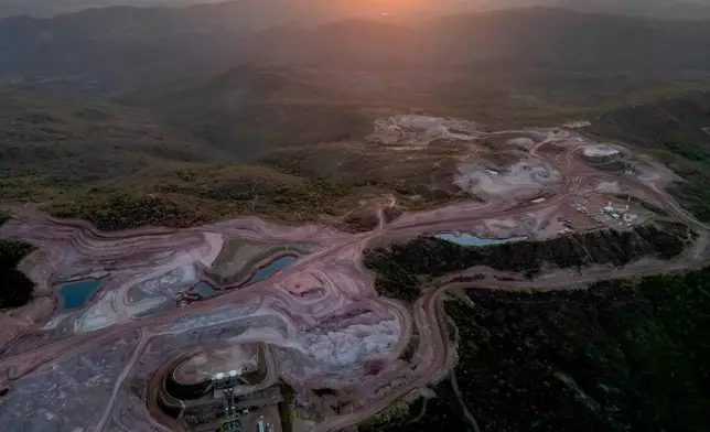 FILE - A mine operated by Serra Verde Mining digs for rare earth elements including neodymium, praseodymium, terbium and dysprosium, which are essential for the production of permanent magnets, in Minacu, Goias state, Brazil, July 28, 2025. (AP Photo/Eraldo Peres, File)