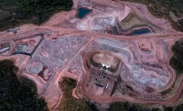 FILE - A mine operated by Serra Verde Mining digs for rare earth elements including neodymium, praseodymium, terbium and dysprosium, which are essential for the production of permanent magnets, in Minacu, Goias state, Brazil, July 28, 2025. (AP Photo/Eraldo Peres, File)