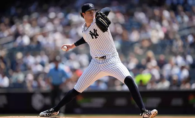 New York Yankees pitcher Cam Schlittler throws during the first inning of a baseball game against the Atlanta Braves, Sunday, Aug. 9, 2026, in New York. (AP Photo/Seth Wenig)