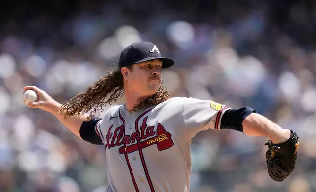 Atlanta Braves pitcher Grant Holmes throws during the first inning of a baseball game against the New York Yankees, Sunday, Aug. 9, 2026, in New York. (AP Photo/Seth Wenig)