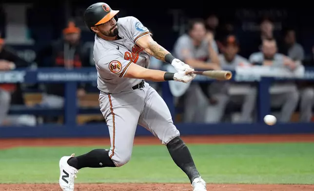 Baltimore Orioles' Christian Encarnacion-Strand connects for a three-run double off Tampa Bay Rays pitcher Joe Boyle during the sixth inning of a baseball game Sunday, Aug. 16, 2026, in St. Petersburg, Fla. (AP Photo/Chris O'Meara)