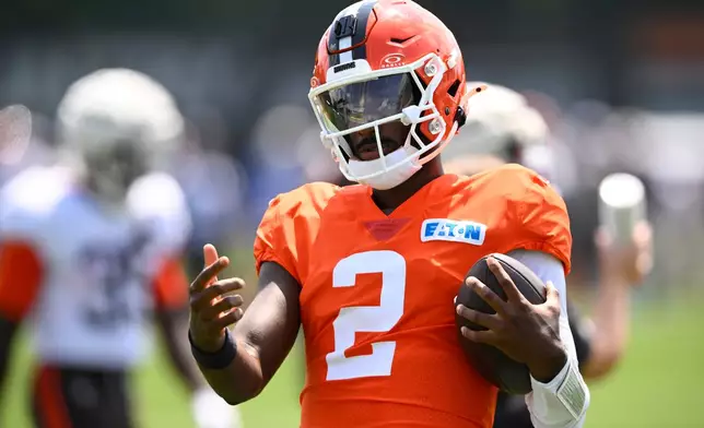 Cleveland Browns quarterback Shedeur Sanders reacts after running to the end zone during a joint NFL football practice with the Buffalo Bills in Berea, Ohio, Thursday, Aug. 20, 2026. (AP Photo/David Richard)