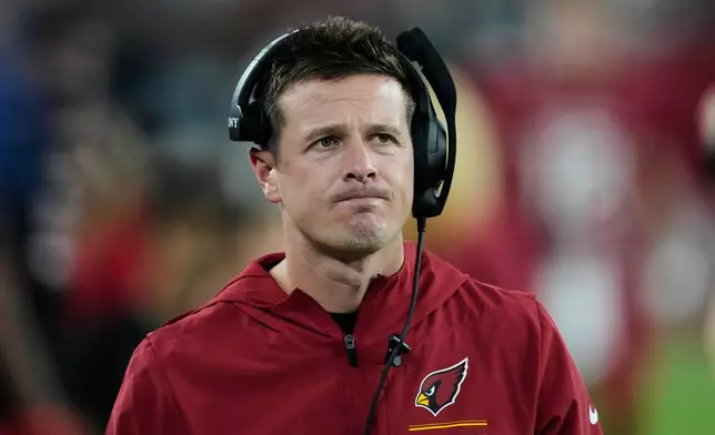 Arizona Cardinals head coach Mike LaFleur stands on the sideline in the first half of a preseason NFL football game against the Dallas Cowboys Saturday, Aug. 22, 2026, in Glendale, Ariz. (AP Photo/Ross D. Franklin)
