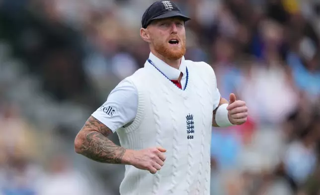 FILE - England's captain Ben Stokes walks onto the field before the start of play on the fourth day of the Test match between England and New Zealand at Lord's cricket ground in London, Sunday, June 7, 2026. (AP Photo/Kirsty Wigglesworth, File)