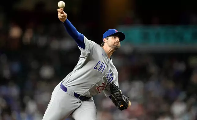 Chicago Cubs starting pitcher Clay Holmes throws against the Arizona Diamondbacks during the first inning of a baseball game, Tuesday, Aug. 25, 2026, in Phoenix. (AP Photo/Ross D. Franklin)