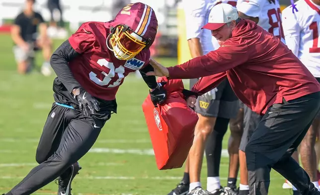 Washington Commanders cornerback Rasul Douglas (31) works out during practice at the team's NFL football training camp, Wednesday, July 29, 2026, in Ashburn, Va. (AP Photo/Rod Lamkey, Jr.)