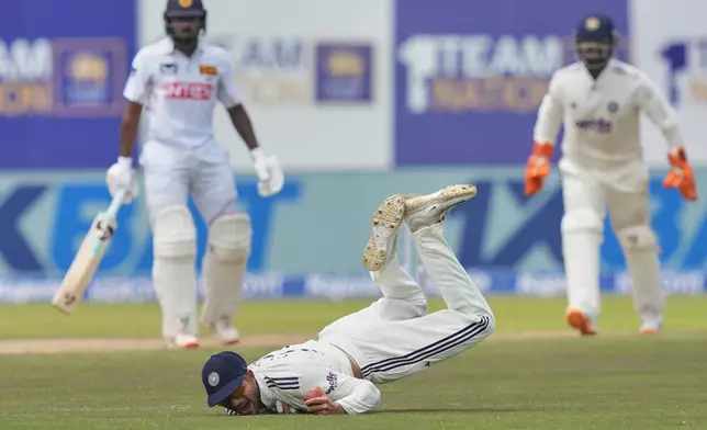 India's captain Shubman Gill takes a catch to dismiss Sri Lanka's Kamindu Mendis during the day three of the first cricket test match between Sri Lanka and India In Galle, Sri Lanka, Monday, Aug. 17, 2026. (AP Photo/Eranga Jayawardena)