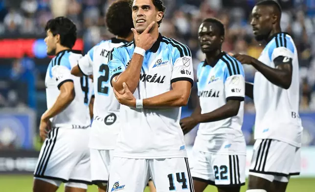 CF Montreal's Daniel Rios (14) reacts after scoring against LA Galaxy during the first half MLS soccer game in Montreal, Saturday, Aug. 22, 2026. (Graham Hughes/The Canadian Press via AP)