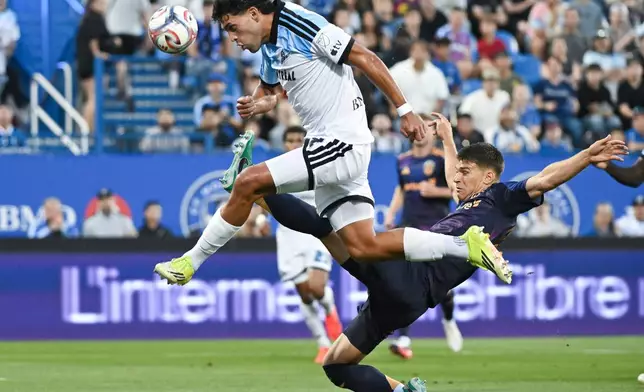 LA Galaxy's Harbor Miller, right, defends against CF Montreal's Daniel Rios during the first half MLS soccer game in Montreal, Saturday, Aug. 22, 2026. (Graham Hughes/The Canadian Press via AP)