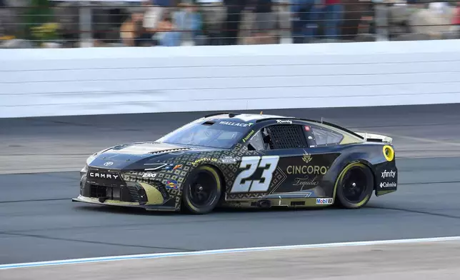 Bubba Wallace steers his car out of Turn 4 during a NASCAR Cup Series auto race, Sunday, Aug. 23, 2026, at New Hampshire Motor Speedway in Loudon, N.H. (AP Photo/Steven Senne)