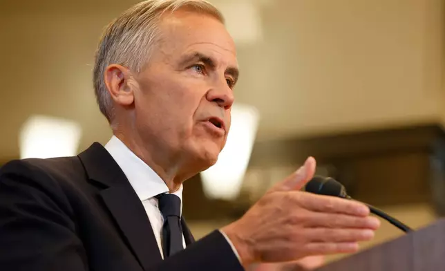 Prime Minister Mark Carney speaks about Canada's response to new U.S. tariffs during a news conference on Parliament Hill in Ottawa on Saturday, Aug. 22, 2026. (Patrick Doyle/The Canadian Press via AP)