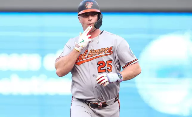 Baltimore Orioles' Pete Alonso (25) celebrates his two run home run against the Minnesota Twins during the first inning of a baseball game, Tuesday, Aug. 11, 2026, in Minneapolis. (AP Photo/Matt Krohn)