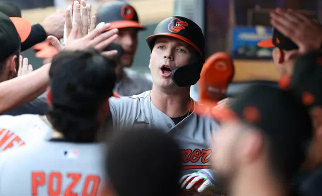Baltimore Orioles' Pete Alonso (25) celebrates his two-run home run against the Minnesota Twins during the first inning of a baseball game, Tuesday, Aug. 11, 2026, in Minneapolis. (AP Photo/Matt Krohn)