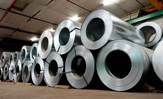 Steel coils, which will be made into roofing, siding and HVAC products, are seen in the manufacturing plant at Ideal Roofing in Ottawa, on Tuesday, Aug. 25, 2026. (Justin Tang/The Canadian Press via AP)