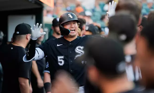 Chicago White Sox's Munetaka Murakami reacts to his home run against the Detroit Tigers during the fourth inning of a baseball game Friday, Aug. 14, 2026, in Detroit. (AP Photo/Paul Sancya)