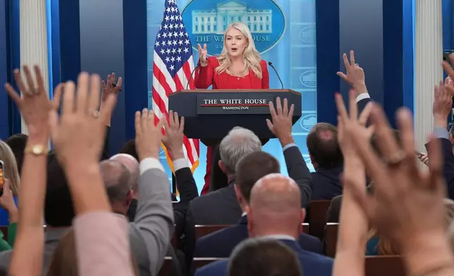 FILE - White House press secretary Karoline Leavitt speaks with reporters in the James Brady Press Briefing Room at the White House, July 23, 2026, in Washington. (AP Photo/Alex Brandon, File)
