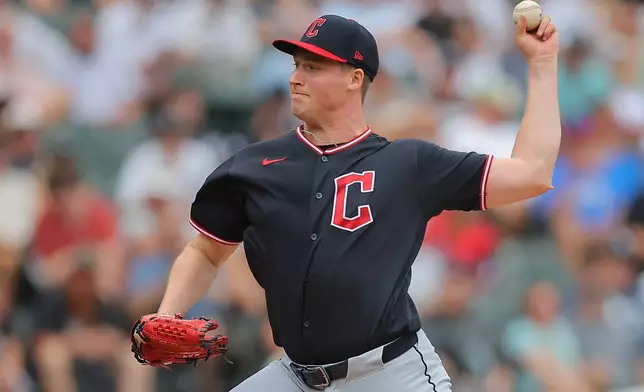 Cleveland Guardians' Tim Herrin throws during the third inning of a baseball game against the Chicago White Sox, Sunday, Aug. 9, 2026, in Chicago. (AP Photo/Melissa Tamez)