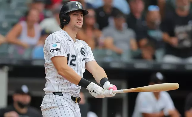 Chicago White Sox's Colson Montgomery watches his three-run home run during the third inning of a baseball game against the Cleveland Guardians, Sunday, Aug. 9, 2026, in Chicago. (AP Photo/Melissa Tamez)