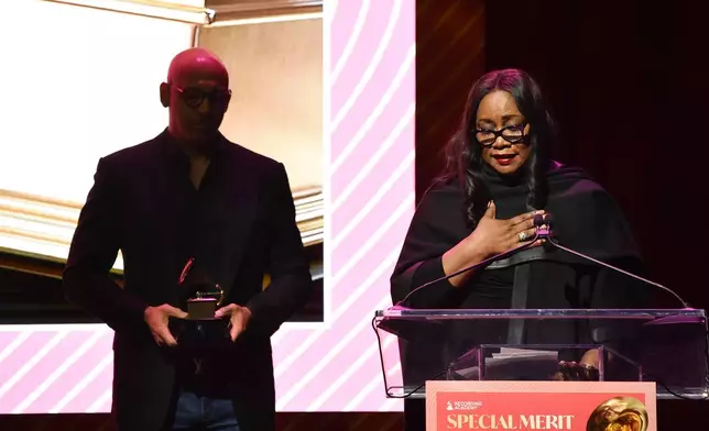 FILE - Pat Houston accepts the lifetime achievement award on behalf of Whitney Houston during the Recording Academy's Special Merit Awards in Los Angeles on Jan. 31, 2026. (Photo by Richard Shotwell/Invision/AP, File)