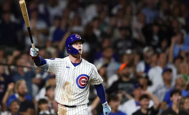 Chicago Cubs' Pete Crow-Armstrong watches his walkoff home run during the 10th inning of a baseball game to defeat the Chicago White Sox in Chicago, Monday, Aug. 17, 2026. (AP Photo/Jessie Alcheh)