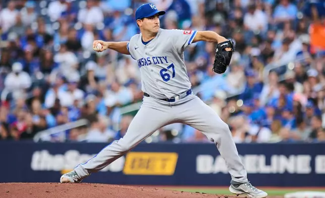 Kansas City Royals pitcher Seth Lugo (67) works against the Toronto Blue Jays during the second inning of a baseball game in Toronto, Tuesday, Aug. 25, 2026. (Sammy Kogan/The Canadian Press via AP)