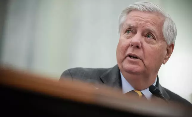 FILE - Sen. Lindsey Graham, R-S.C., introduces Adm. Kevin Lunday, acting commandant of the U.S. Coast Guard, during a Senate Commerce, Science and Transportation Committee hearing on the nomination Lunday for Commandant of the Coast Guard, Nov. 19, 2025, on Capitol Hill in Washington. (AP Photo/Julia Demaree Nikhinson, File)