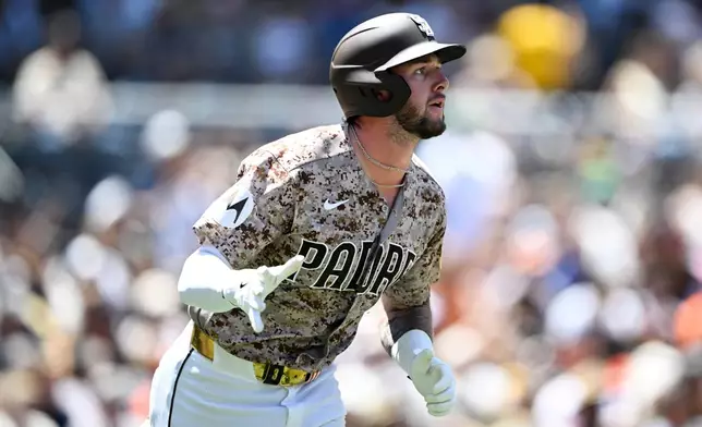 San Diego Padres' Jackson Merrill rounds the bases after hitting a two-run home run during the second inning of a baseball game against the San Francisco Giants Sunday, Aug. 2, 2026, in San Diego. (AP Photo/Denis Poroy)