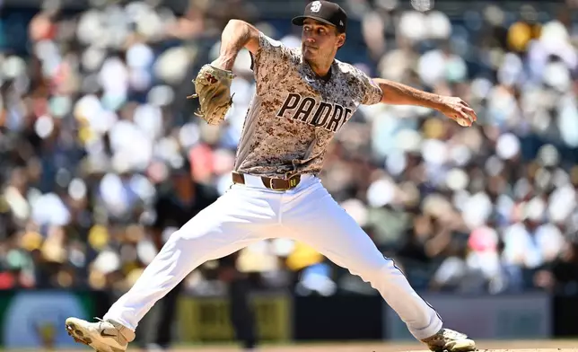 San Diego Padres pitcher Kyle Hart delivers during the first inning of a baseball game against the San Francisco Giants, Sunday, Aug. 2, 2026, in San Diego. (AP Photo/Denis Poroy)