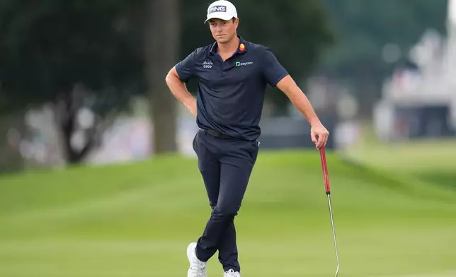 Viktor Hovland, of Norway, waits to putt on the first green during the third round of the PGA Tour Championship golf tournament, Saturday, Aug 29, 2026, in Atlanta.(AP Photo/Mike Stewart)