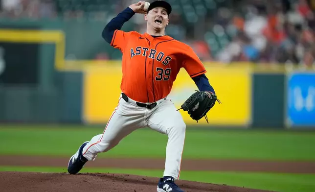Houston Astros pitcher Hayden Wesneski delivers during the first inning of a baseball game against the Athletics, Friday, Aug. 21, 2026, in Houston. (AP Photo/Kevin M. Cox)